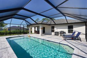 New Build Pool Home With Modern Design and Open Floor Plan in Cape Coral