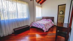 Casa amplia cerca de Baños de Agua Santa