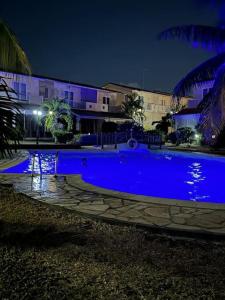 At home by the pool in Mauritius - with a cause