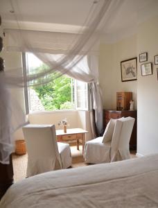 Maisons d'hotes ferme st pierre 2 suites avec repas, piscine, clim, cheminee ou baignoire spa : photos des chambres