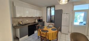 Appartements T3 spacieux lumineux jardin et proche du tram : photos des chambres