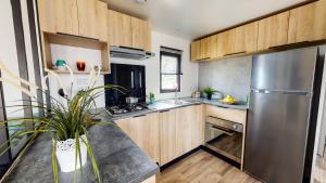 Maisons de vacances Camping Officiel Siblu Le Pipiou : photos des chambres