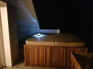Chalets Chalet au coeur de la montagne jacuzzi prive : photos des chambres