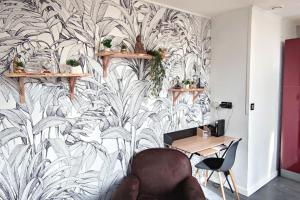 Appartements Le Bouda avec un balcon vue sur la Republique : photos des chambres