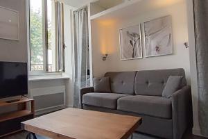 Appartements Le Bouda avec un balcon vue sur la Republique : photos des chambres