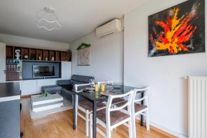 Appartements Chez Virgil - Terrasse vue degagee, parking prive : photos des chambres