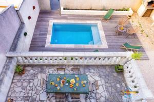 Maisons de vacances Maison Jade - Villa avec piscine - Barbecue - Calme : photos des chambres