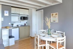 Appartements L’Oasis des Nouveaux Bassins - apt vue port : photos des chambres