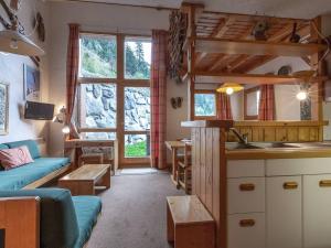 Duplex spacieux avec terrasse, garage, et WIFI à Méribel - FR-1-355-7