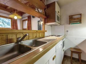 Duplex spacieux avec terrasse, garage, et WIFI à Méribel - FR-1-355-7