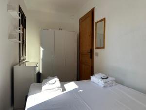 Welc-ōM Battisti Cozy Flat