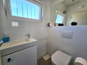 Two-Bedroom Apartment room in Apartment Olga