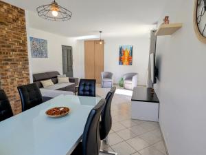 Maison plain pied avec jardin clos à Longchamps - FR-1-585-137