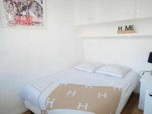 Appartements Deauville Plage - Balcon, Vue Mer & Ville a pied : photos des chambres