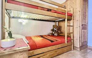 Résidence Le Bec Rouge - joli studio 4 personnes à Tignes ski aux pieds et proche des commerces dans le quartier du Lac. Situé au 6ème étage dune grande MAE-2125