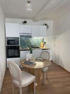 Appartements Au coeur de la baie : photos des chambres
