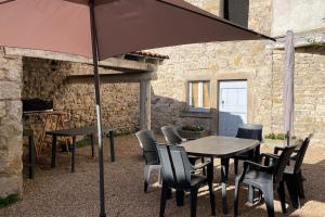 Maisons de vacances La Sauvetat - Charmante maison en pierre : photos des chambres