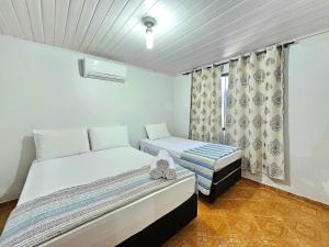 Casa Familiar Espaço Amplo com churrasqueira