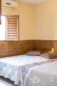 casasveraneio , Barra de são Miguel casa com 4 quartos sendo 2 suítes,todos com ar condicionado, 300 m da praia, 5 minutos praia das conchas e 10 do gunga! Área de lazer com piscina de 10 m churrasqueira e freezer!a melhor!