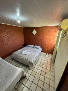 Casa Duplex com 2 suítes com ar condicionado ,100m da Praia - Barra de São Miguel, a 8 minutos da praia do gunga e a 3 da praia bonita! Condomínio com piscina e churrasqueira!