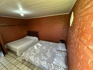 Casa Duplex com 2 suítes com ar condicionado ,100m da Praia - Barra de São Miguel, a 8 minutos da praia do gunga e a 3 da praia bonita! Condomínio com piscina e churrasqueira!