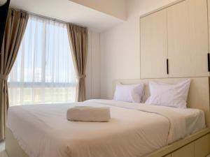 Comfort Strategic 2BR Apartment at Tokyo Riverside PIK 2 By Travelio