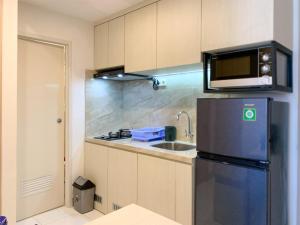 Comfort Strategic 2BR Apartment at Tokyo Riverside PIK 2 By Travelio