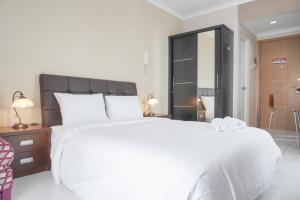 Nice and Cozy Studio at Signature Park Tebet Apartment By Travelio