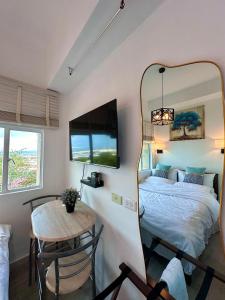 Studio One Condominium, Alabang - Bluu - Fiber Wi-Fi, Netflix-ready