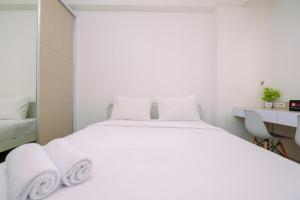 Minimalist and Best Deal Studio Room at Signature Park Grande Apartment By Travelio