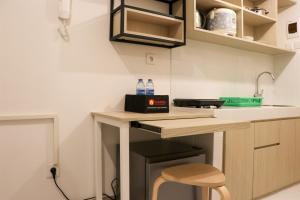 Relaxing and Comfy Studio at Tokyo Riverside PIK 2 Apartment By Travelio