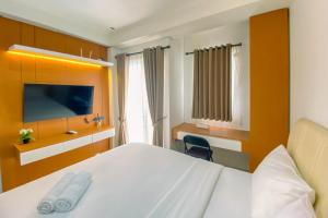 Minimalist Studio Apartment Signature Park Grande By Travelio