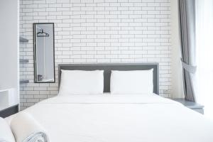 Cozy Studio at Tifolia Apartment By Travelio