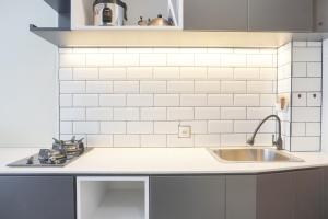 Cozy Studio at Tifolia Apartment By Travelio