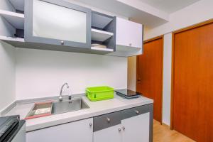 Comfortable and Warm 2BR at Tifolia Apartment By Travelio