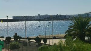 Lanzarote Beachfront Apartment on Las Cucharas Beach with a sea view