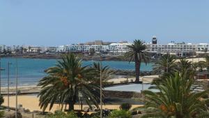 Lanzarote Beachfront Apartment on Las Cucharas Beach with a sea view