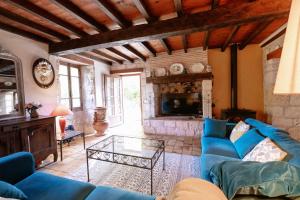Maisons de vacances La Maison des Chenes - Piscine et grand terrain arbore dans une ambiance bucolique. : photos des chambres