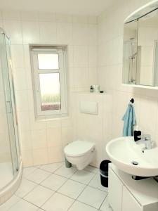 Seyfarthrooms - Ferienwohnung Zum Dorfladen Rathen - zentrale Lage mit direkter Anbindung an das Wanderwegenetz, moderne Inneneinrichtung