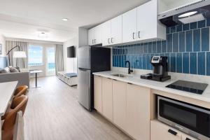 One-Bedroom King Suite with Sofa Bed - Oceanfront room in Dunes Manor Hotel & Dunes Suites