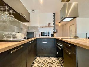 Appartements 147 - Vue Cite Medievale et Parking : photos des chambres