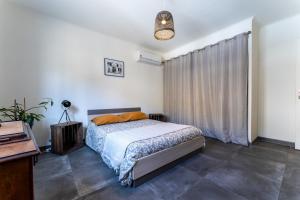 Appartements Le Petit Cocon de Provence - Appt climatise : photos des chambres