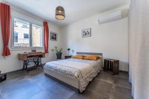 Appartements Le Petit Cocon de Provence - Appt climatise : photos des chambres