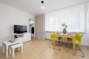 Family Apartment with Balcony by Noclegi Renters