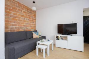 Family Apartment with Balcony by Noclegi Renters