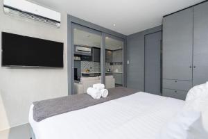 Tropical & Relaxing Stay at Tropics Kamala Suite CTG L304, Top Amenities, close to FantaSea and Café Del Mar Beach Club