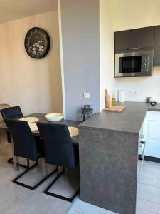 Appartements Le XV Au coeur de la ville : photos des chambres