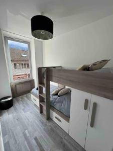 Appartements Le XV Au coeur de la ville : photos des chambres