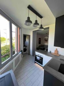 Appartements Le XV Au coeur de la ville : photos des chambres