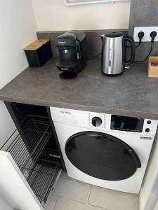 Appartements Le XV Au coeur de la ville : photos des chambres